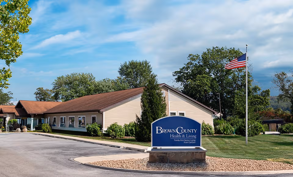 Exterior view of Brown County Health and Living Community with a blue front sign.