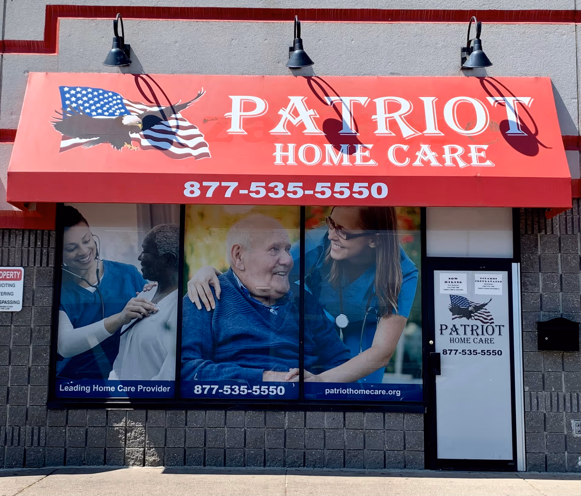 Red storefront awning reads Patriot Home Care above windows with caregivers and elderly clients.