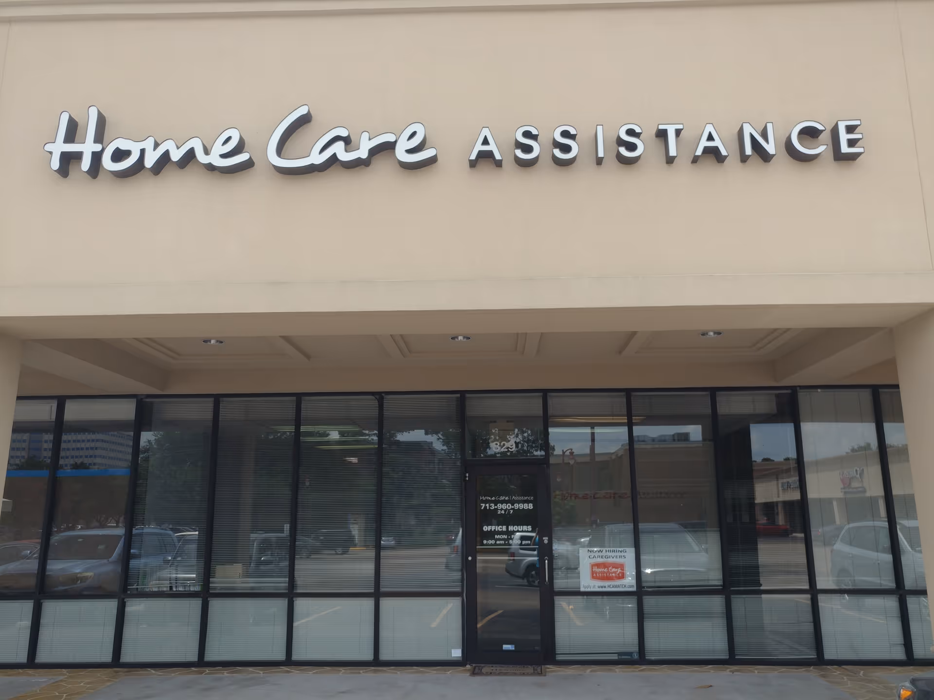 Exterior storefront of Home Care Assistance with large glass windows and entrance.