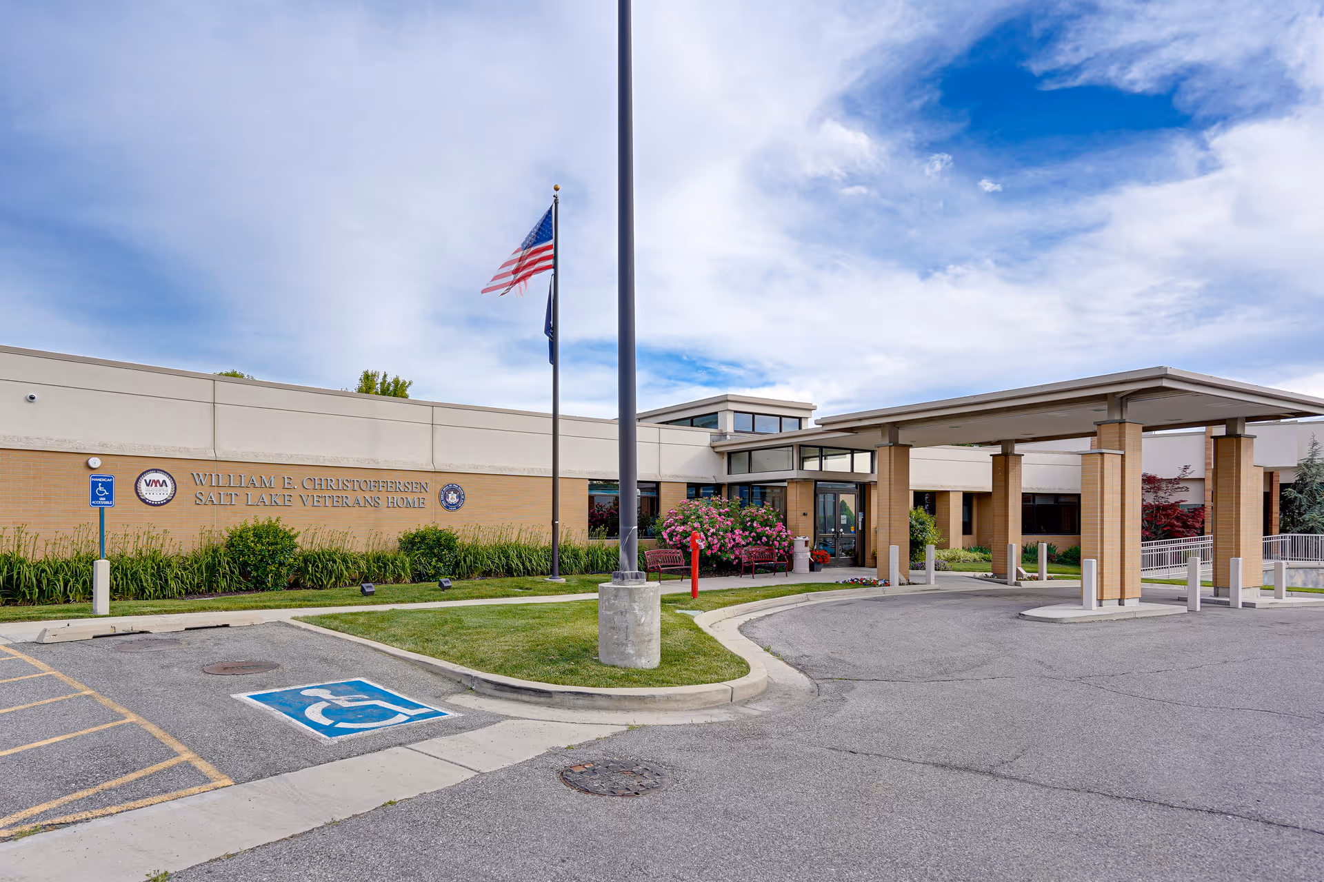 Exterior view of William E. Christoffersen Salt Lake Veterans Home with entrance canopy.