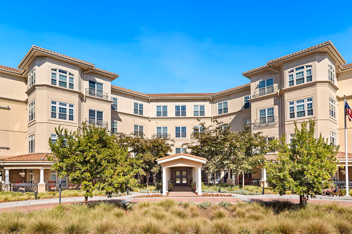 Exterior view of Ultimate Homecare of Solon 2 facility with landscaped entrance.