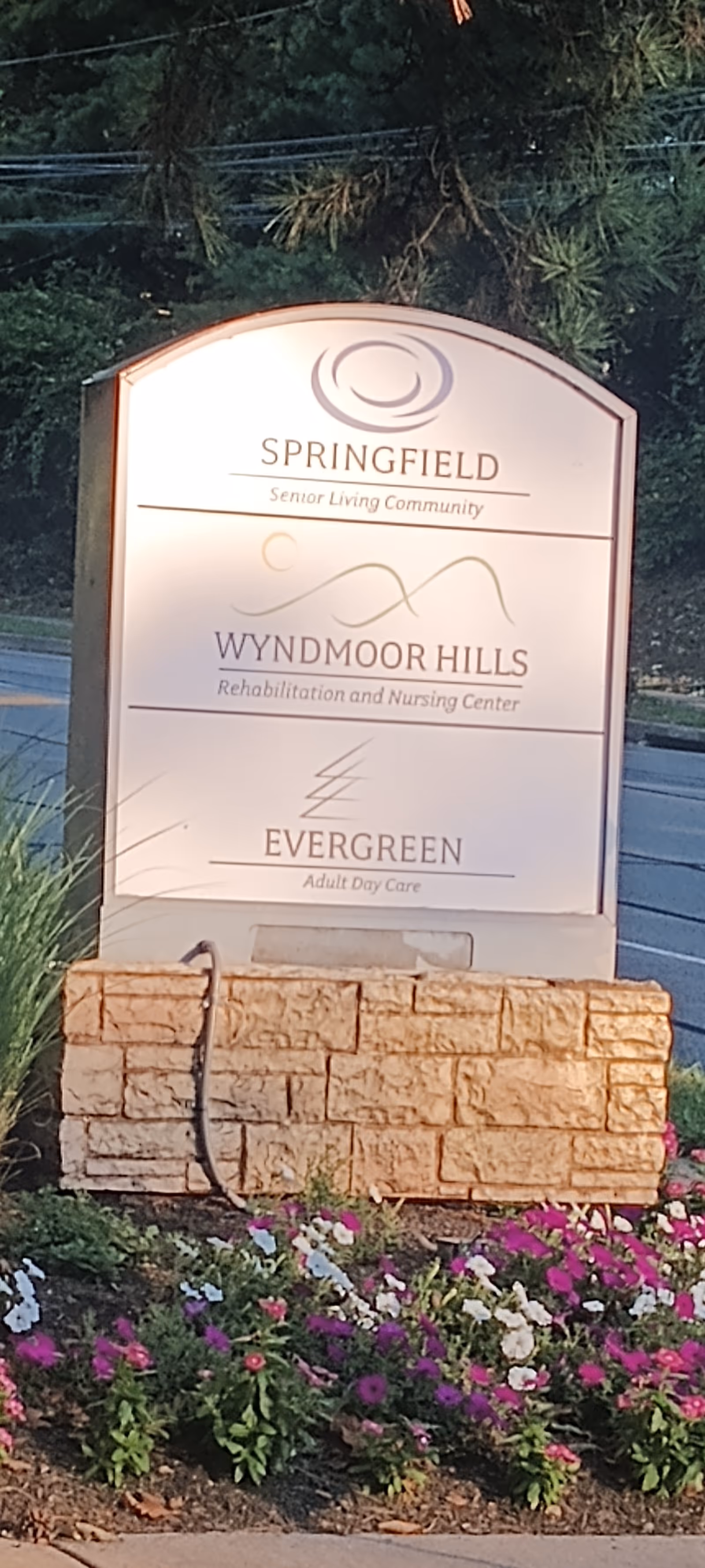 Outdoor sign for Wyndmoor Hills Rehabilitation and Nursing Center at the front entrance.