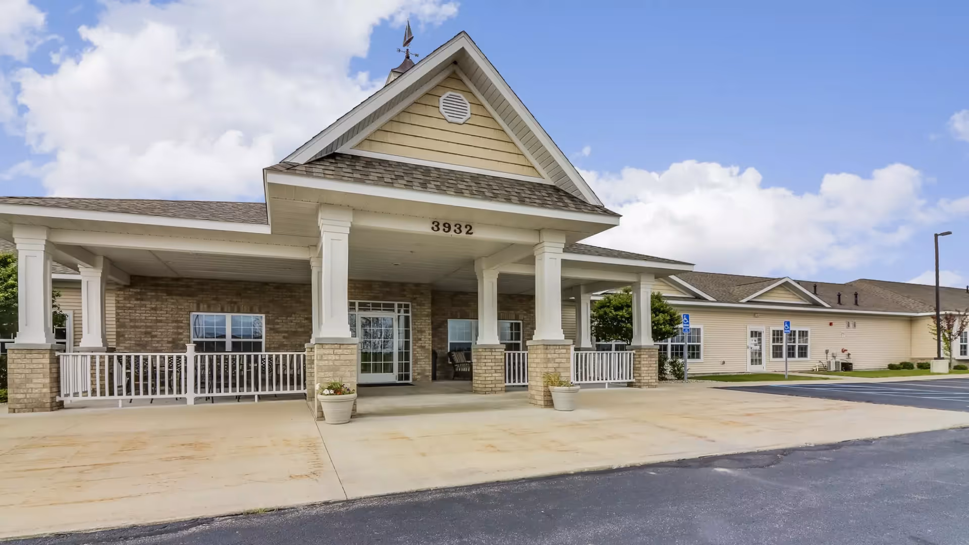 Front view of Bayfield Assisted Living & Memory Care building with entry porch and columns
