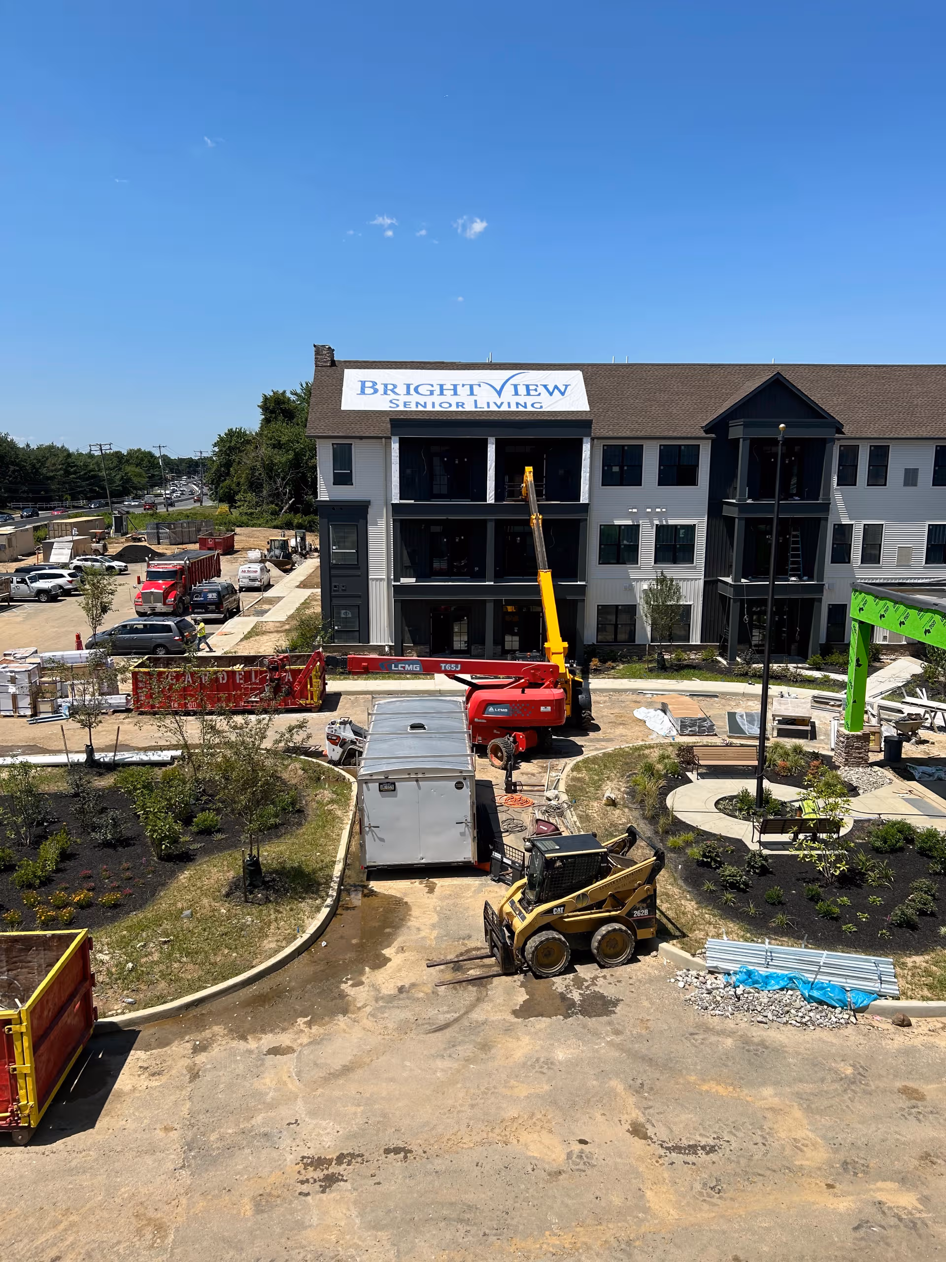 Front view of Brightview Senior Living under construction with equipment.
