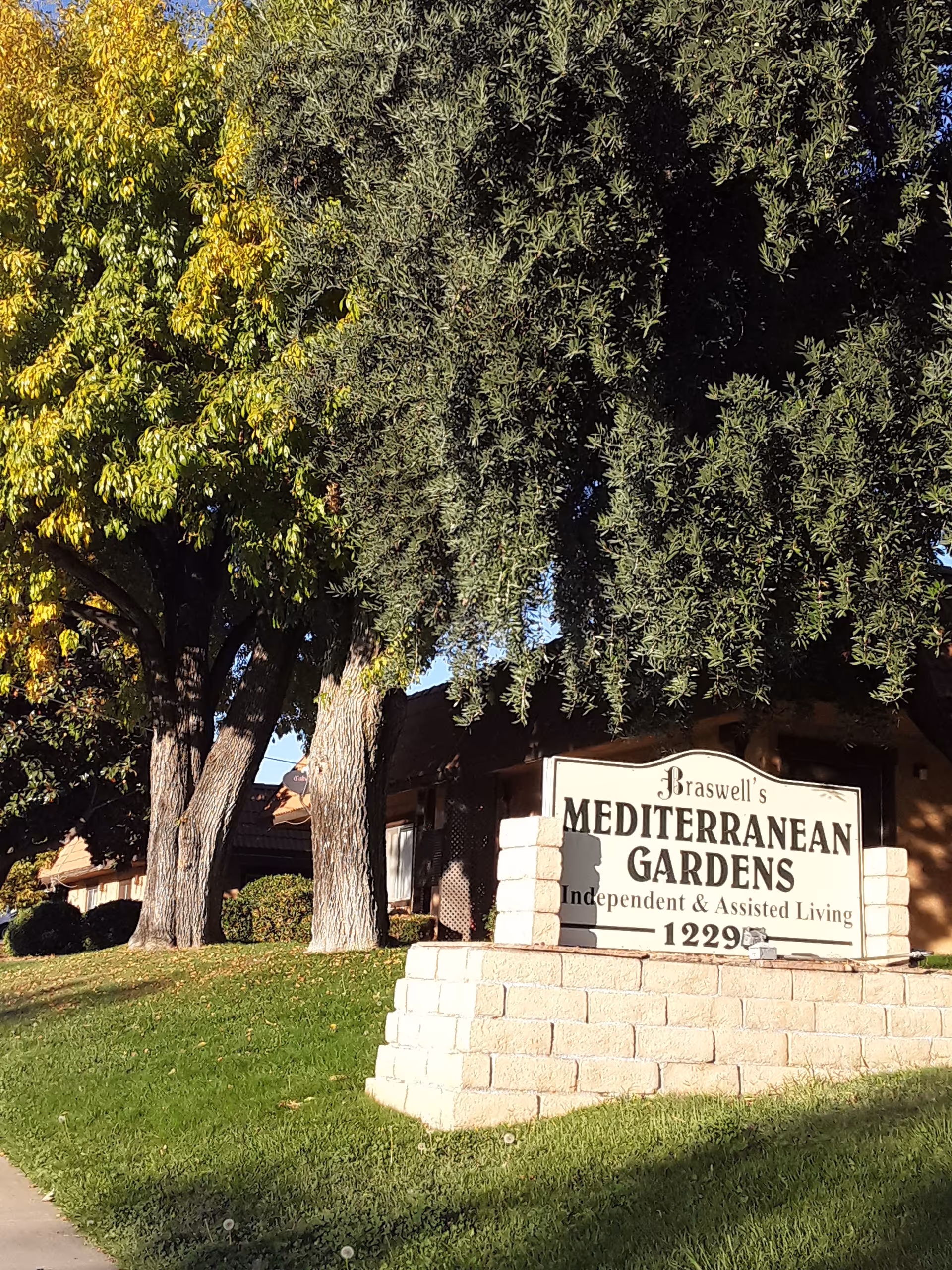 Exterior view of Braswell's Mediterranean Gardens sign at the facility entrance.