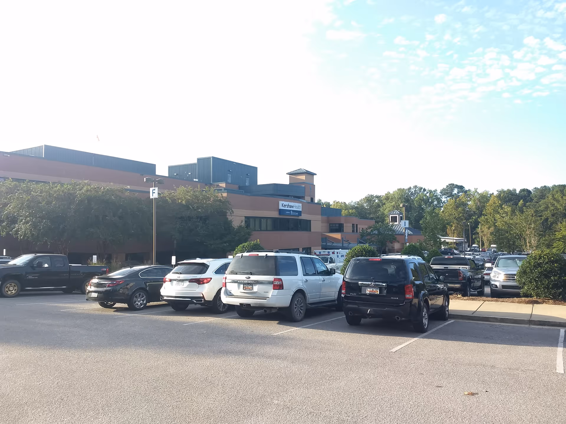 Exterior view of MUSC Health Kershaw Medical Center with a parking lot in front