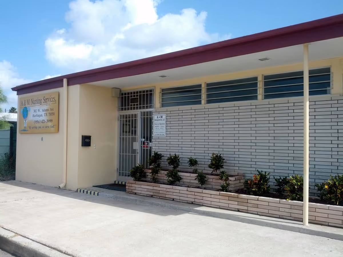 Exterior view of A & M Nursing Services, LLC building with entrance and landscaping.