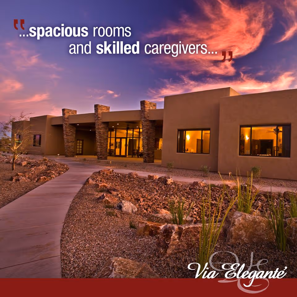 Front exterior of a modern senior living facility with a curved walkway.