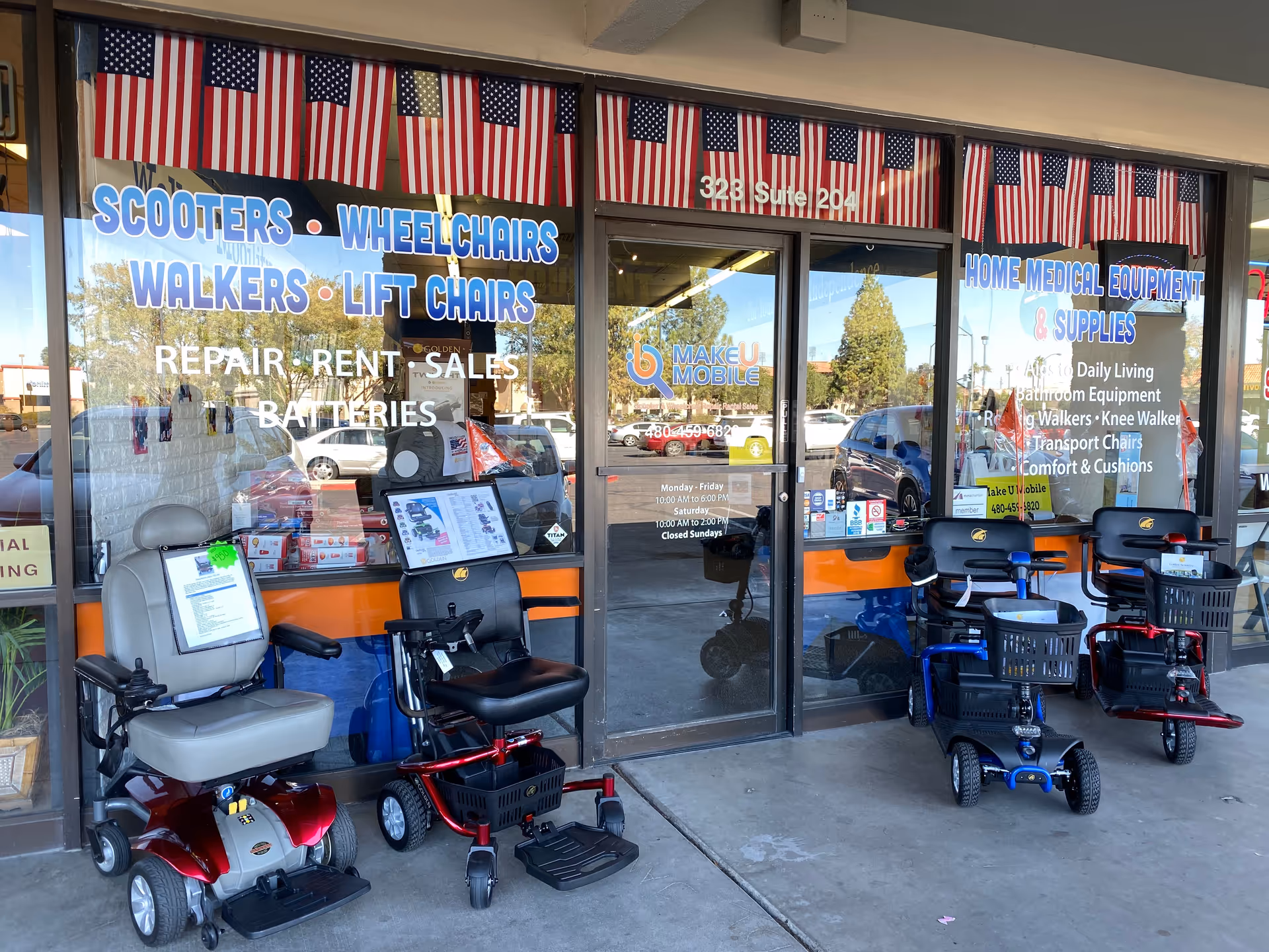 Front storefront displaying mobility scooters and home medical equipment outside.