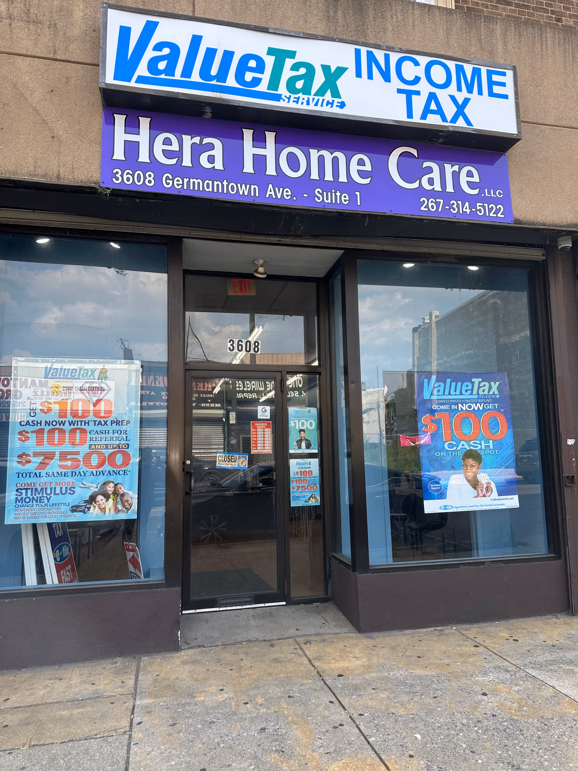 Front of Hera Home Care LLC storefront with purple sign and ValueTax sign above.