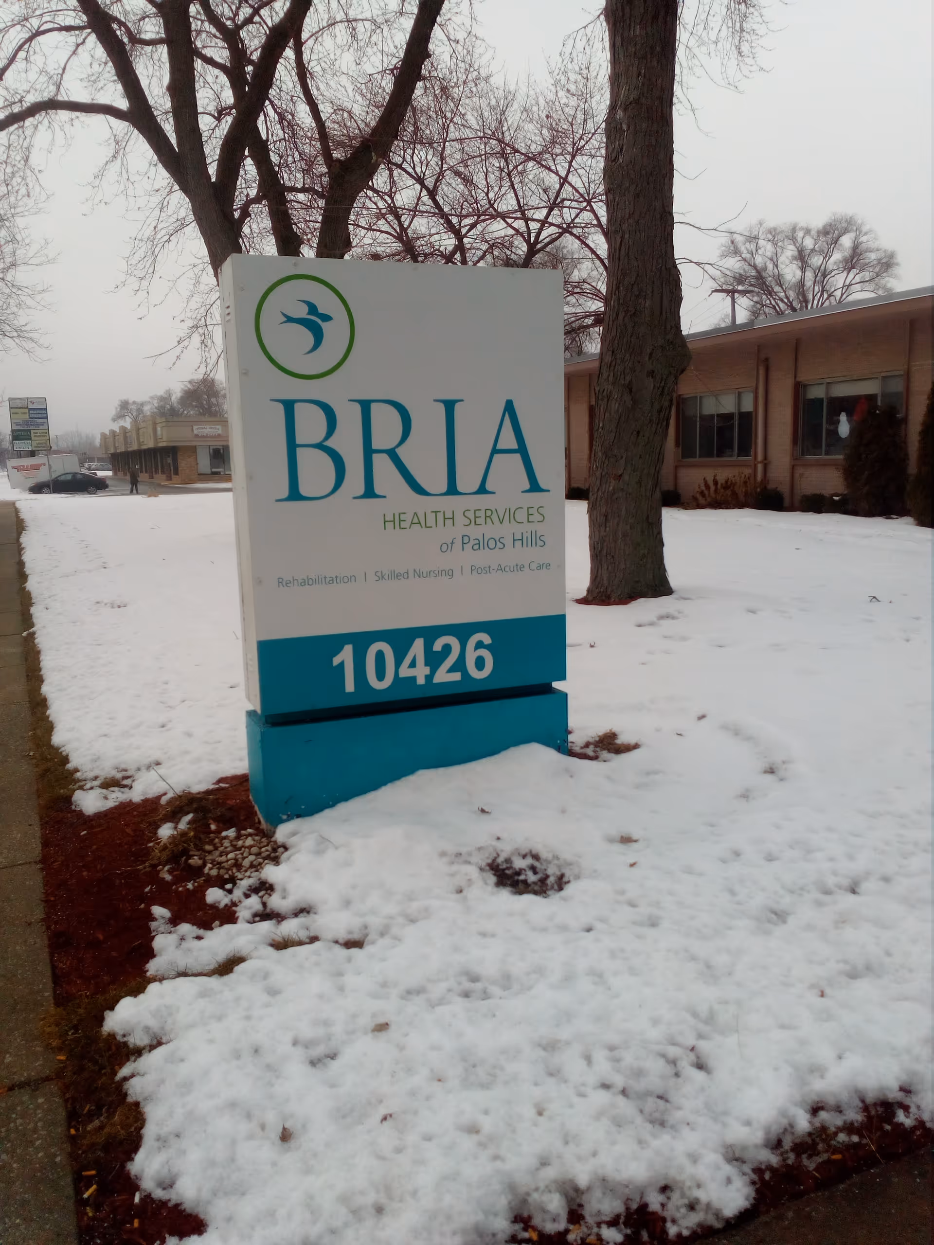 Sign for Bria Health Services outside a snow-covered building.