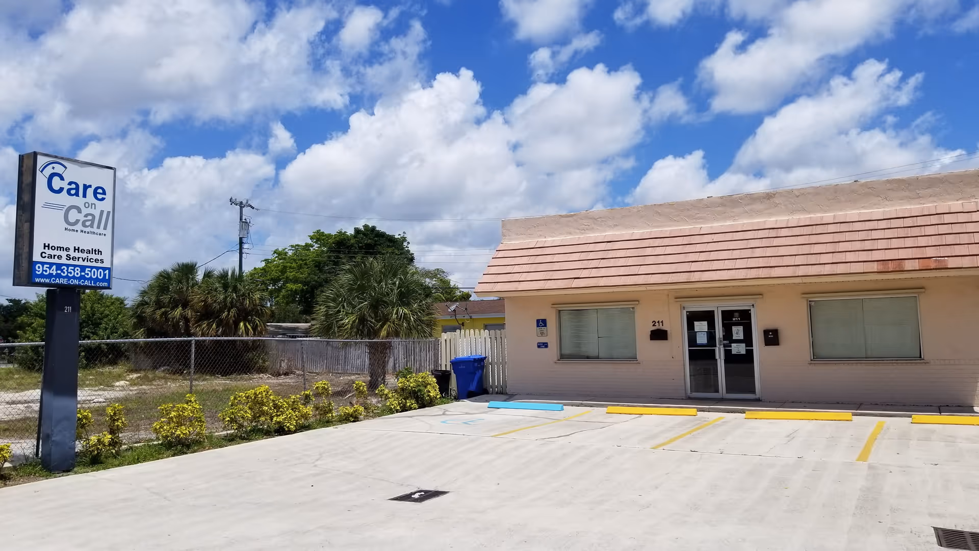 Exterior view of Care on Call Home Healthcare building with parking lot and sign.