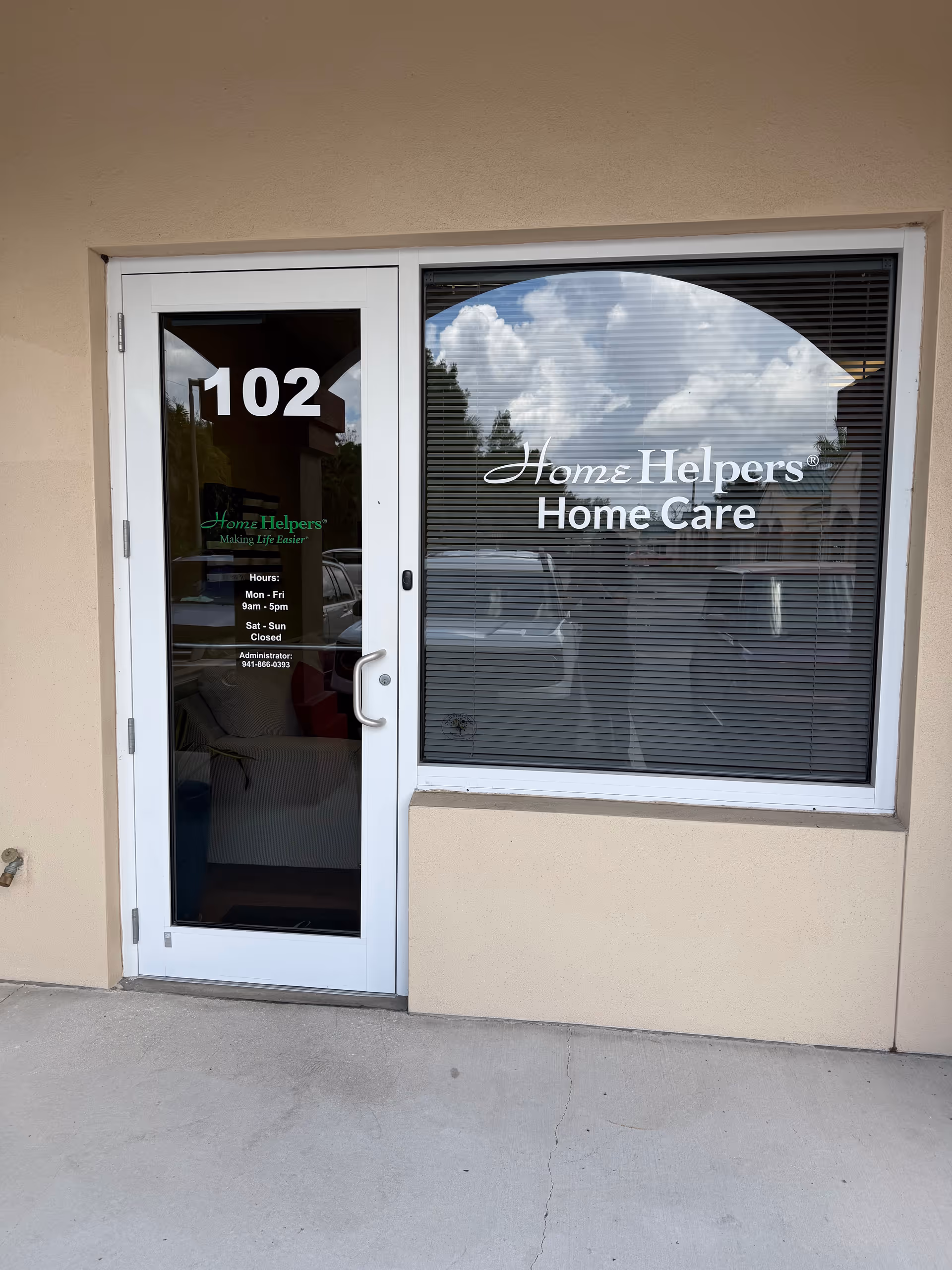 Entrance door and window display for Home Helpers Home Care, 102.