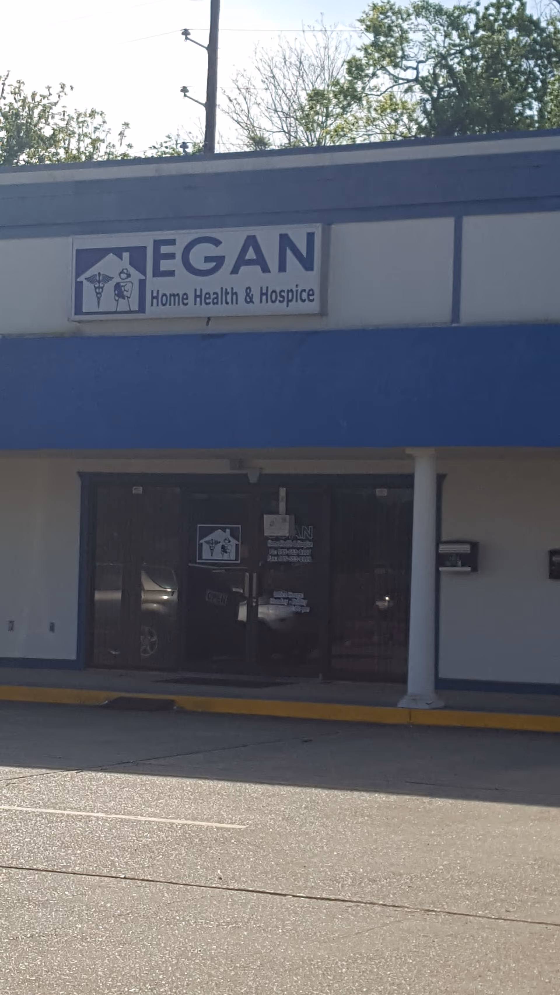 Front exterior of a building with an EGAN Home Health & Hospice sign.