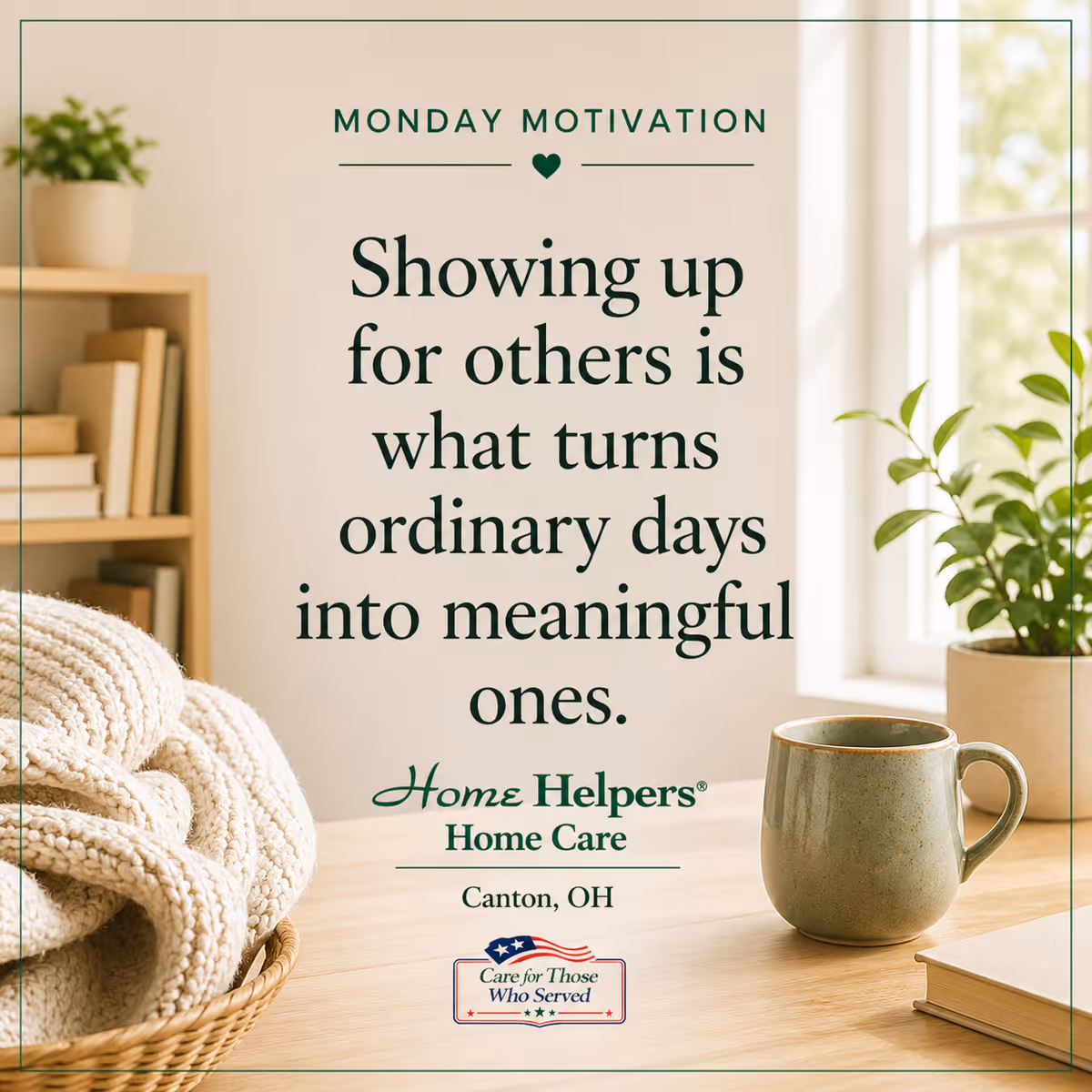 Cozy indoor space with a motivational poster, mug, plant, and blanket on a wooden table.