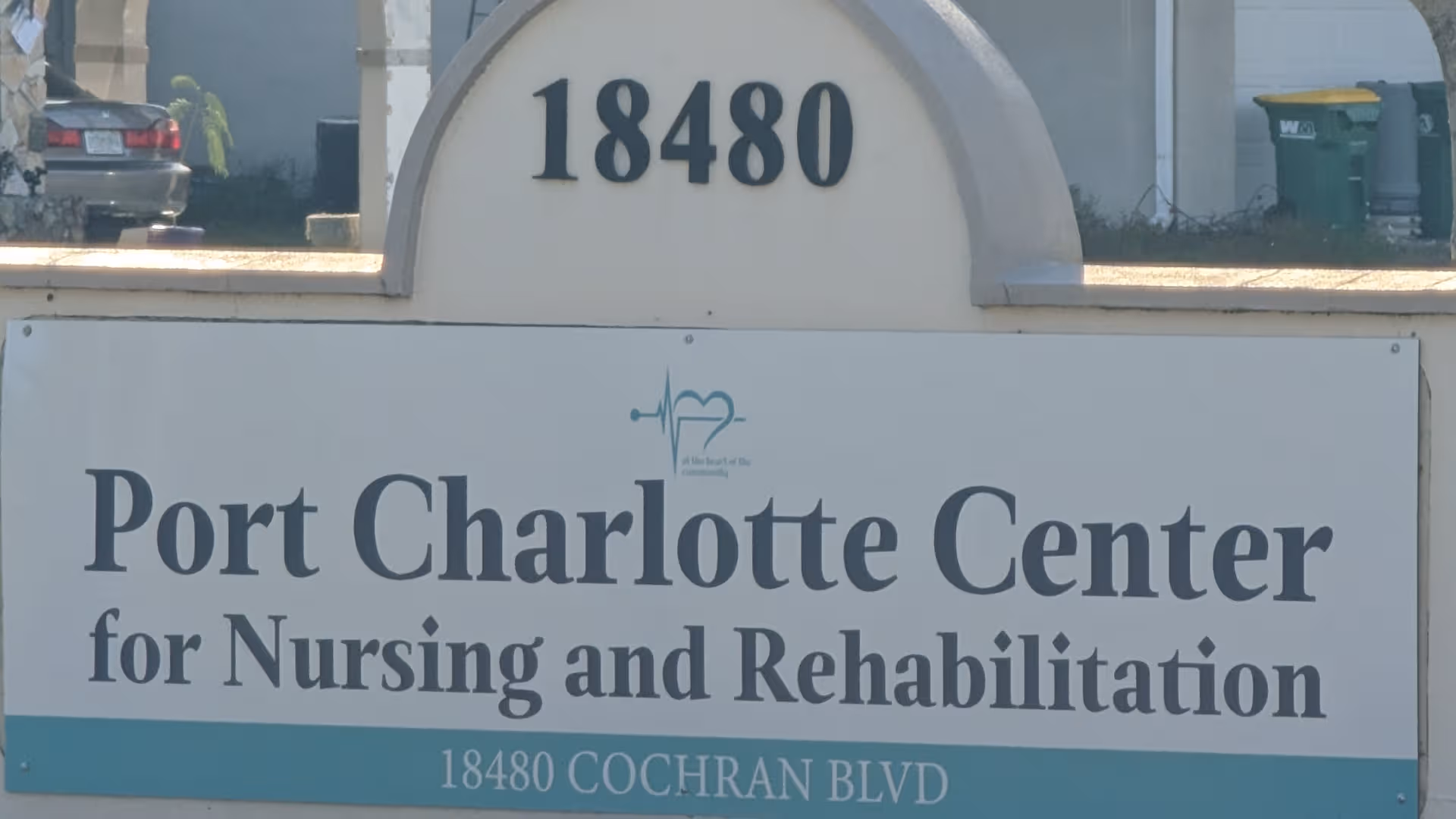 Outdoor sign reads Port Charlotte Center for Nursing and Rehabilitation, 18480 Cochran Blvd.
