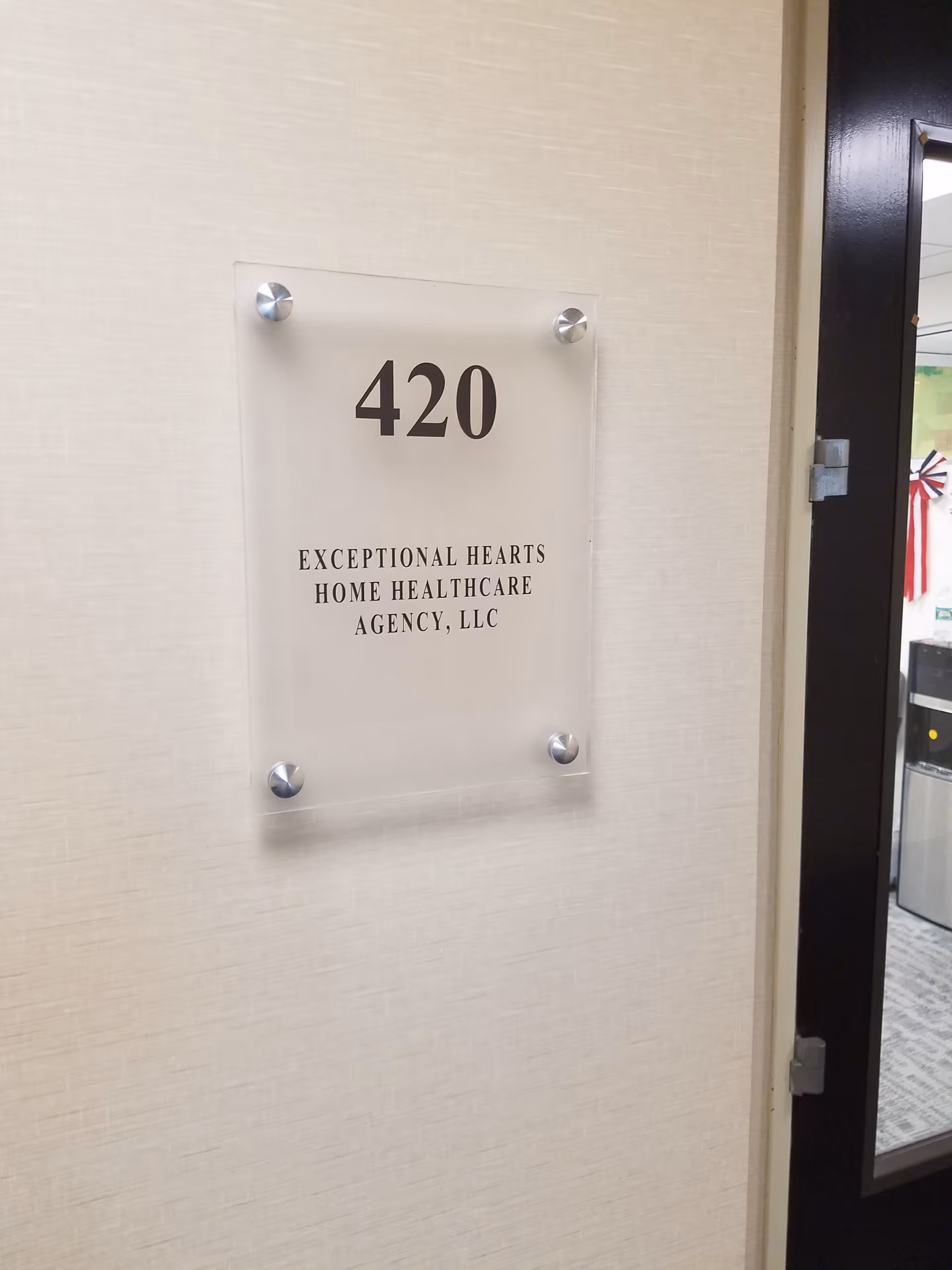 Interior wall plaque reads 420 for Exceptional Hearts Home Healthcare Agency, LLC.