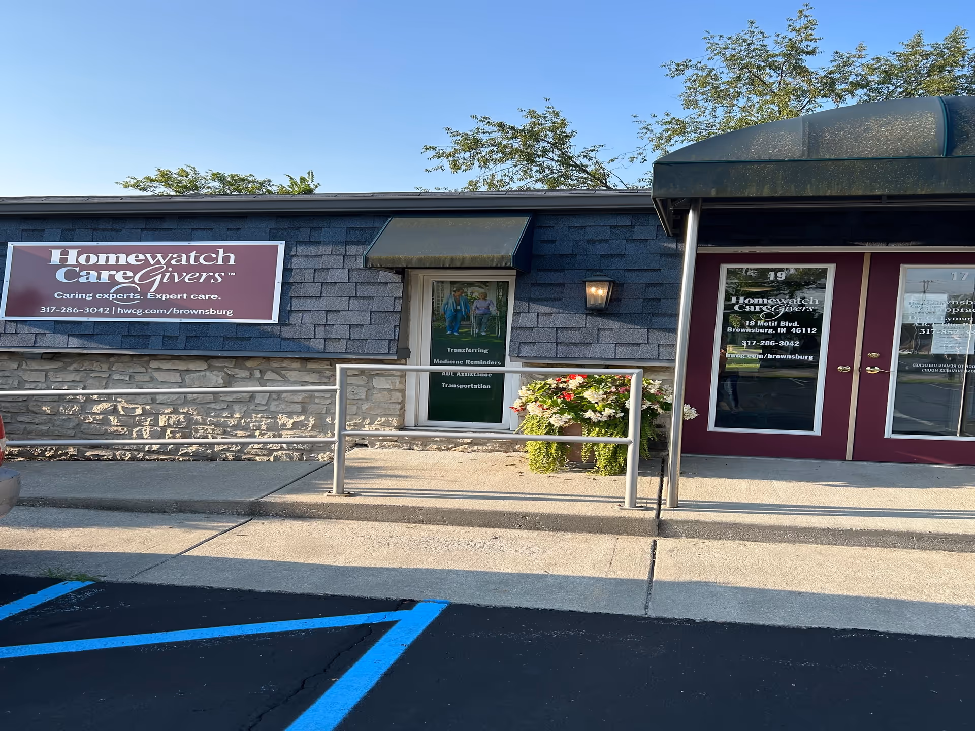 Front exterior of Homewatch CareGivers Brownsburg building with ramp and entrance doors.