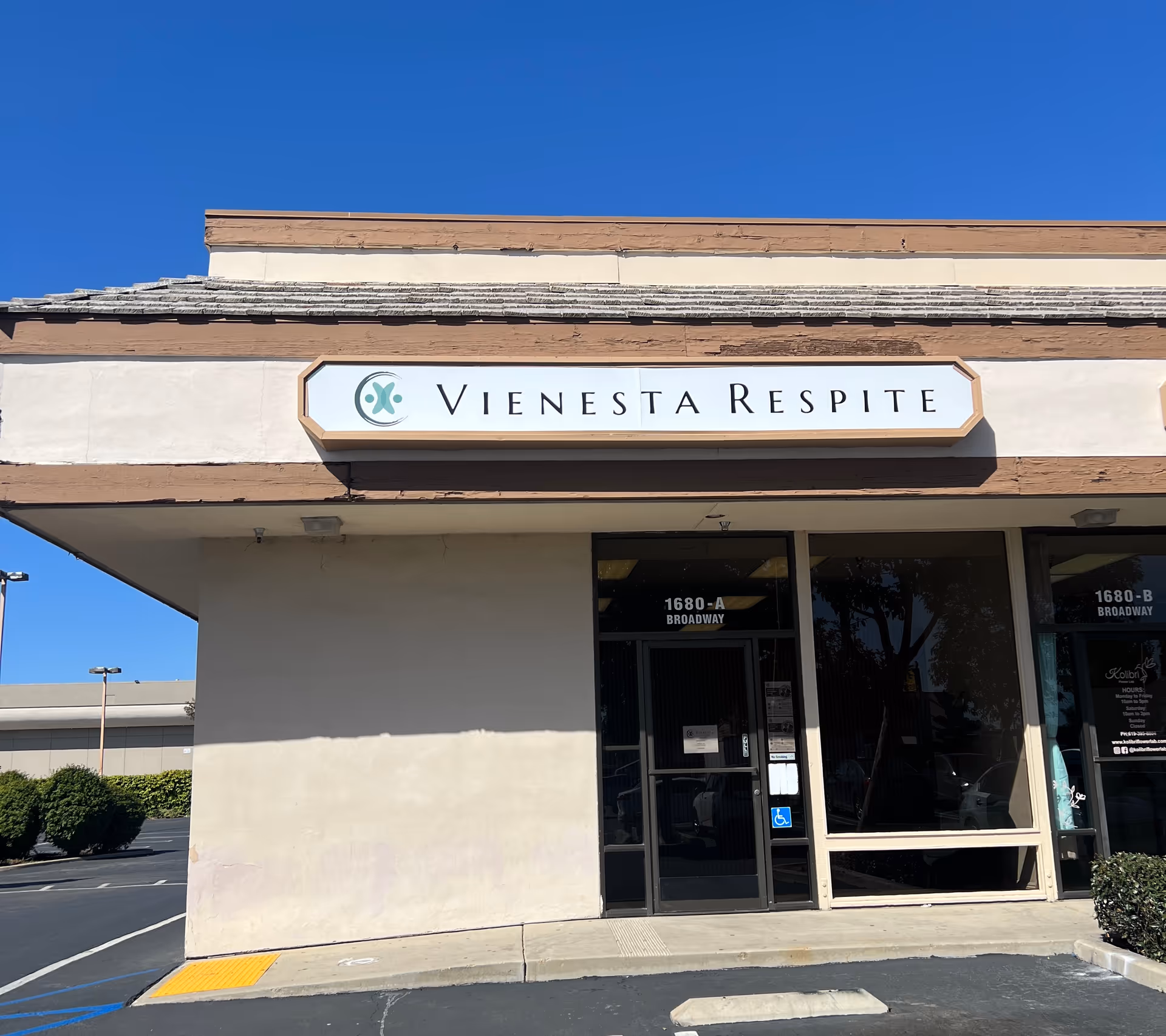 Front view of Vienesta Respite building with its sign.