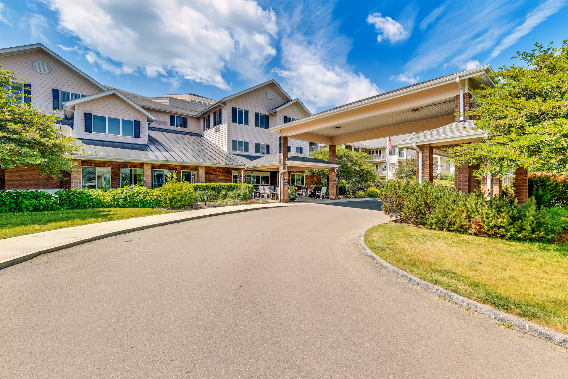 Front view of Solstice Senior Living at Bangor with a curved driveway and entrance.