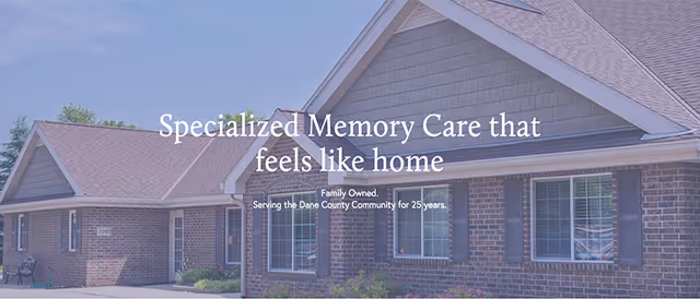Brick senior living facility exterior with a gabled roof and text overlay.