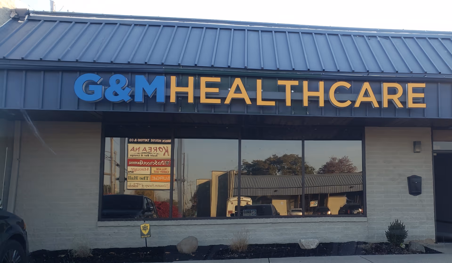 G&M Healthcare storefront sign on a single-story building exterior