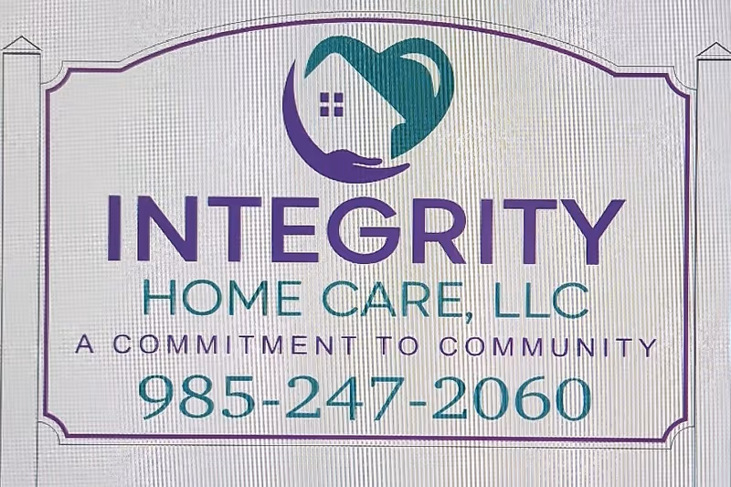 Outdoor sign for Integrity Home Care, LLC with logo and phone number.