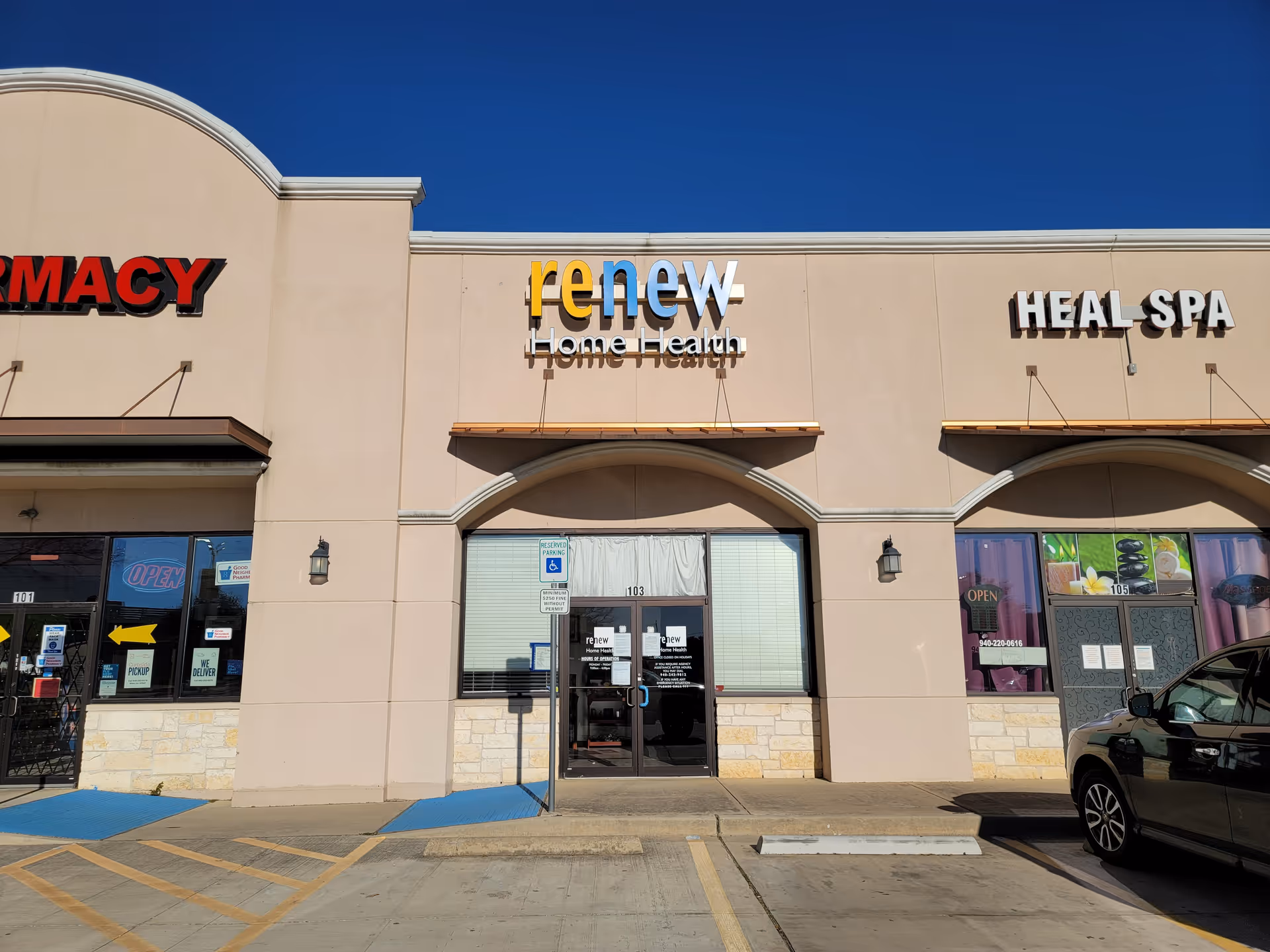 Front exterior of a strip mall with Renew Home Health sign.