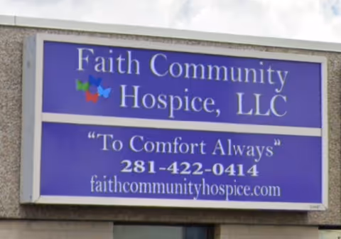 Blue Faith Community Hospice, LLC sign mounted on a building exterior.