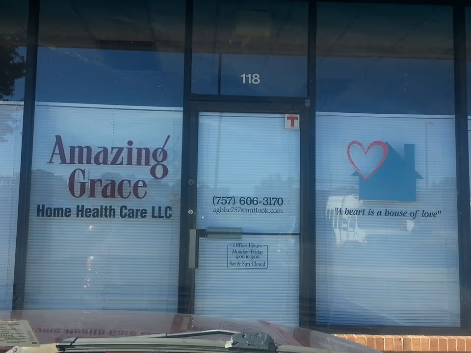 Storefront of Amazing Grace Home Health Care LLC with glass windows and signage.