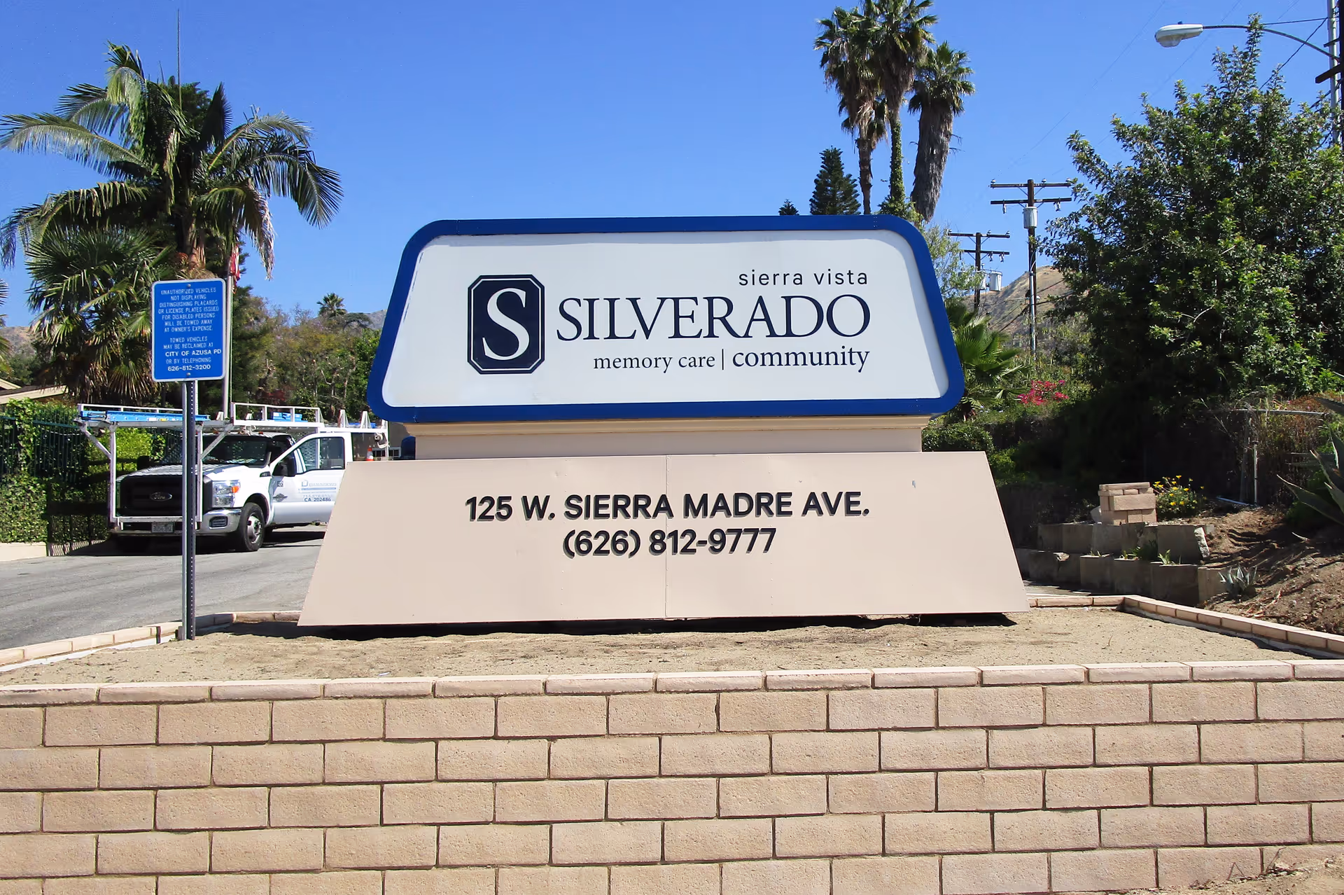 Large outdoor sign for Silverado Sierra Vista memory care community displaying address and contact number.