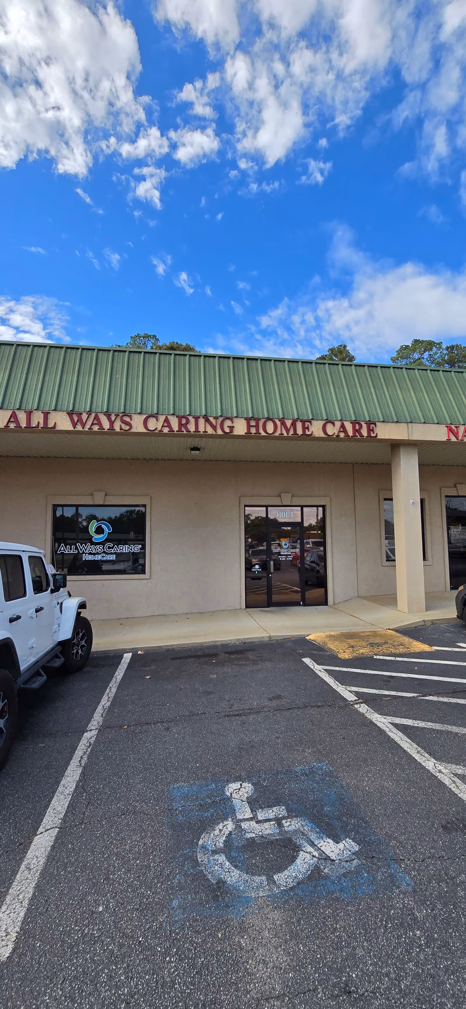 Front of All Ways Caring HomeCare building in Dublin, GA, with a handicap parking space.