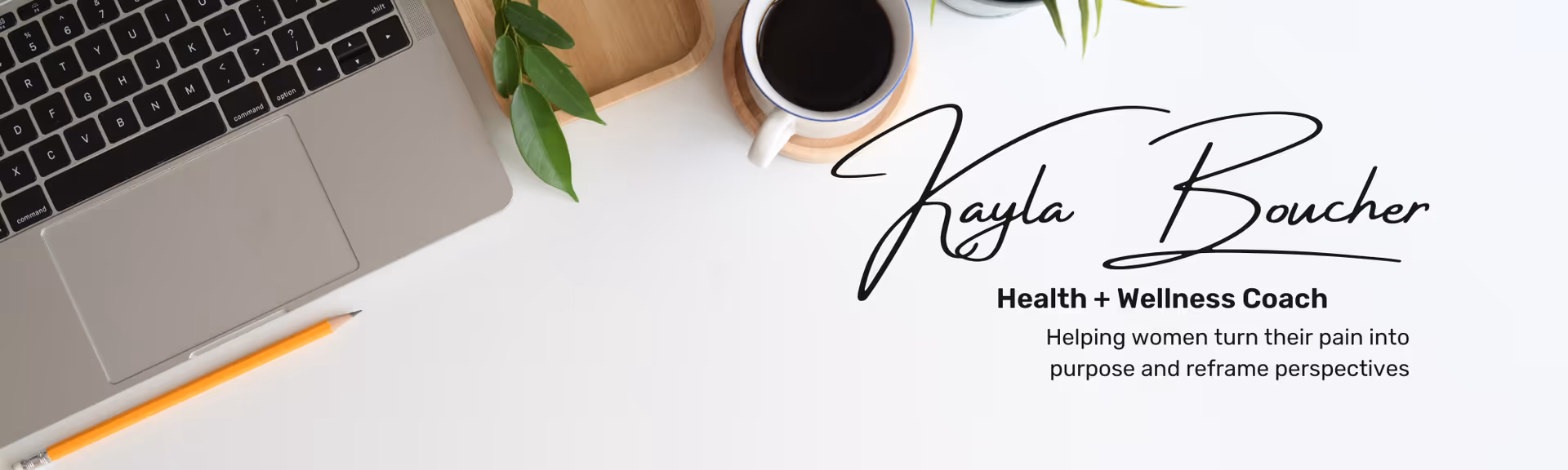 A clean desk featuring a laptop, coffee, pencil, and Kayla Boucher branding.