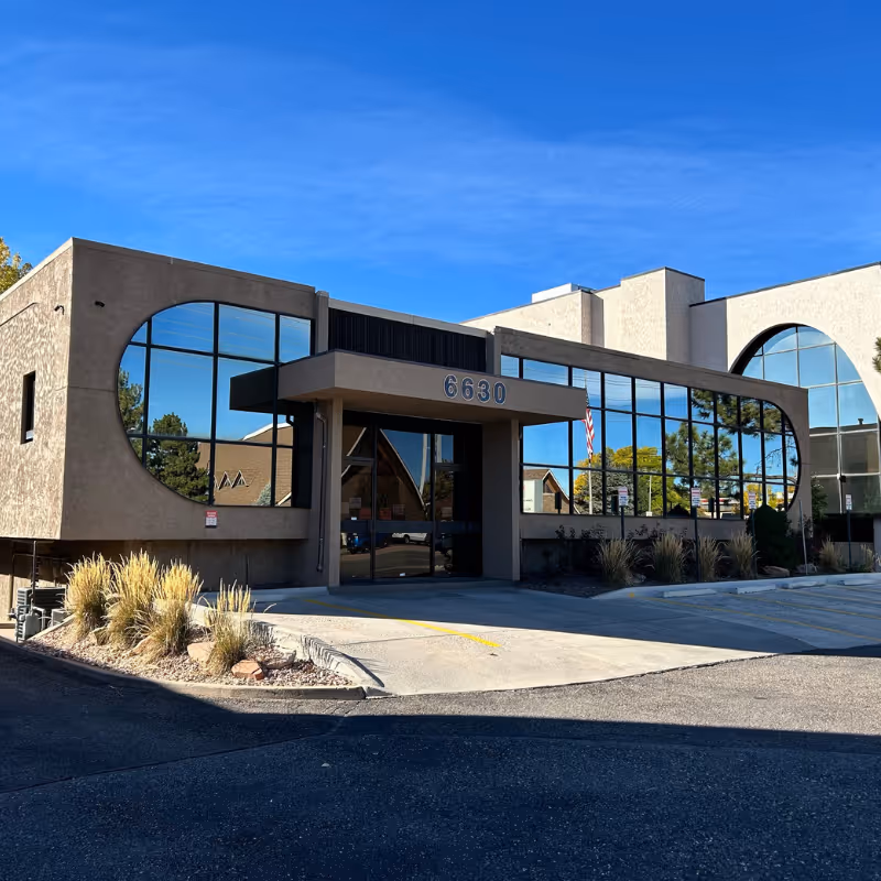 IRN Home Care facility entrance with curved glass windows and the address 6630.