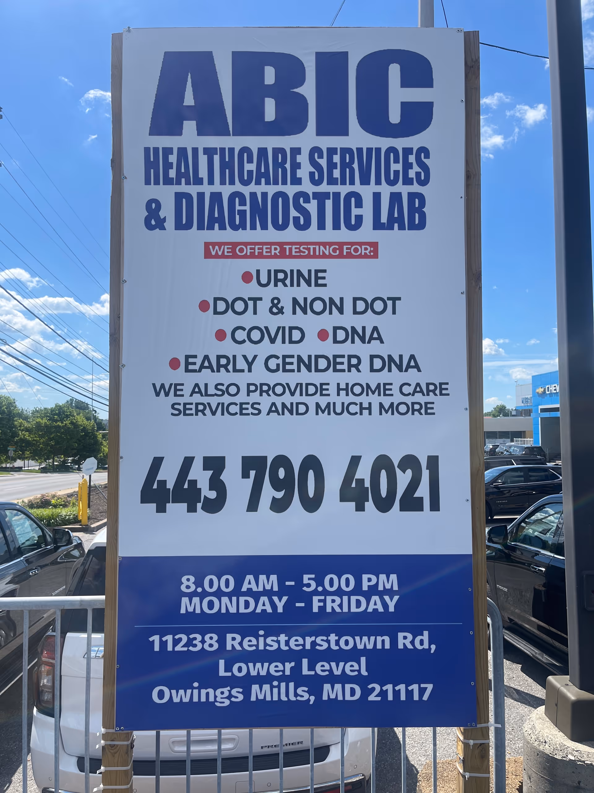 Tall outdoor sign reads ABIC Healthcare Services & Diagnostic Lab with address and hours.