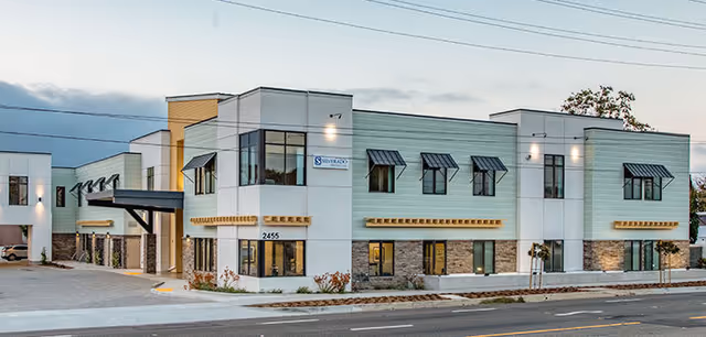 Exterior view of Silverado Rolling Hills Memory Care Community building along the street.