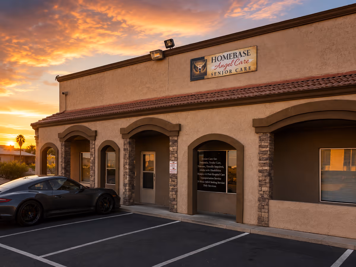 Sunset-lit exterior of Homebase Angel Care Senior Care building with a parked car.