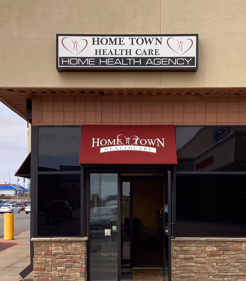 Exterior view of Home Town Health Care building with signage above the entrance