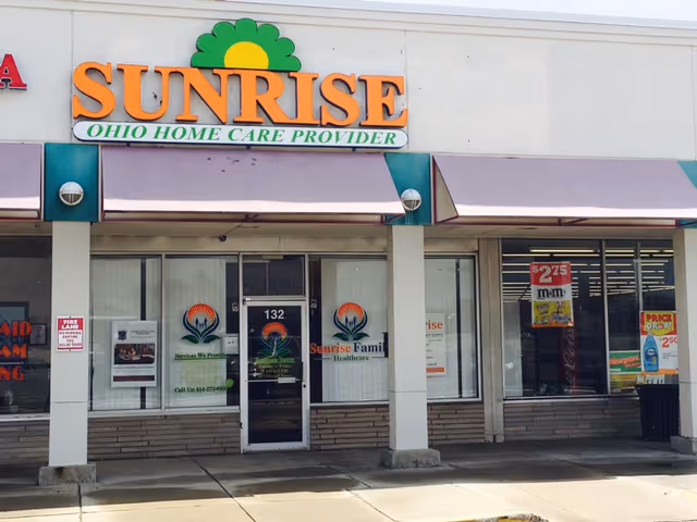 Sunrise Family Homecare storefront with orange logo sign and large windows.