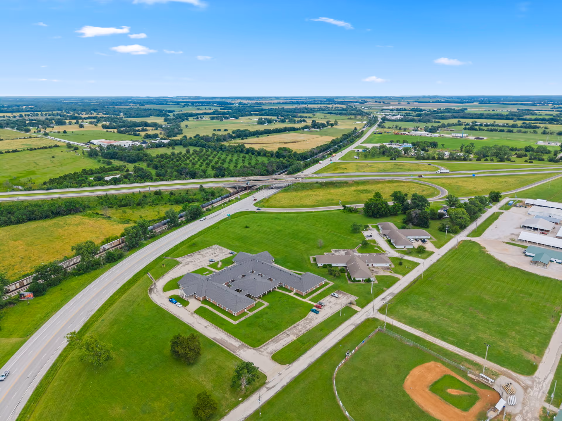 Aerial view of Joe Clark Residential Care Home campus surrounded by roads and green fields.