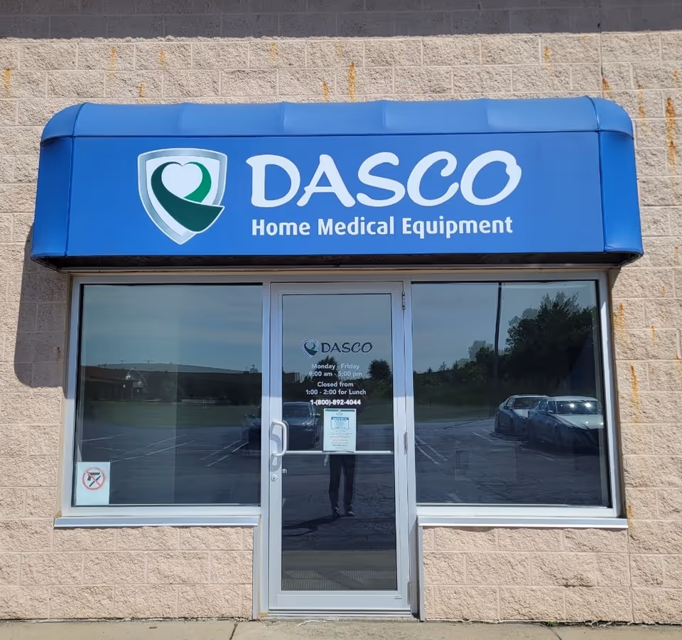 Blue DASCO sign above glass door entry of a medical equipment storefront in Marysville.