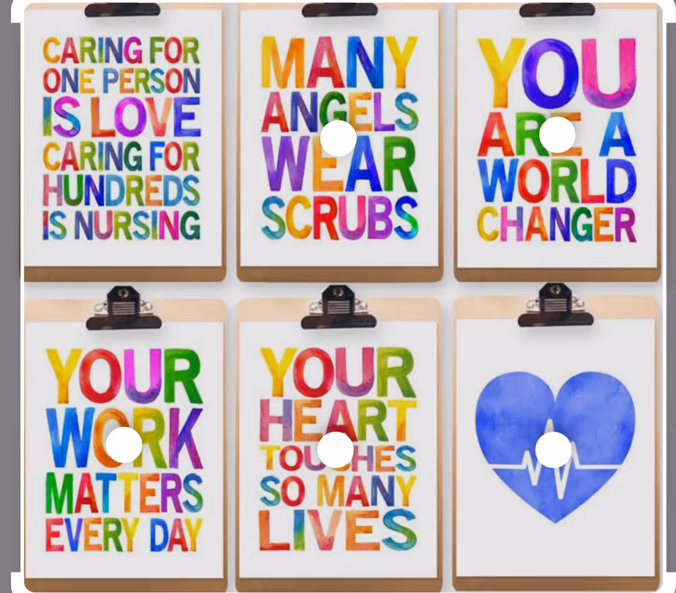 Six colorful framed posters with uplifting phrases arranged on clipboards along a wall.