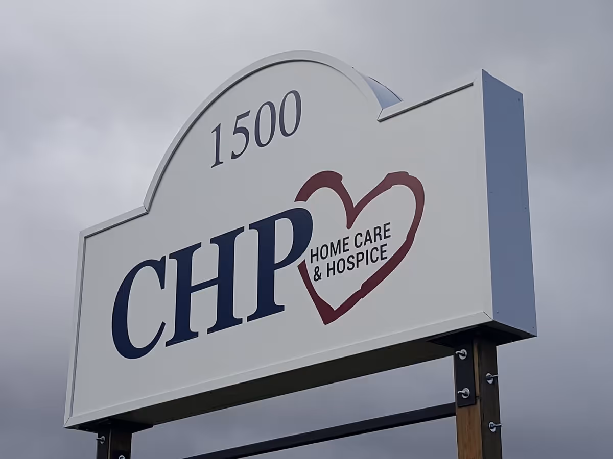 Outdoor sign reads CHP Home Care & Hospice with a heart logo.