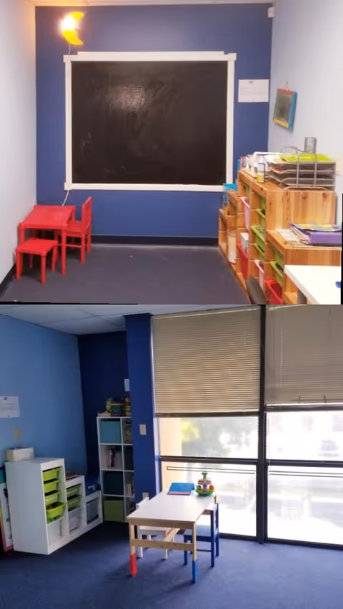 Two adjacent activity rooms with blackboard, small red table and chairs, and colorful storage shelves.