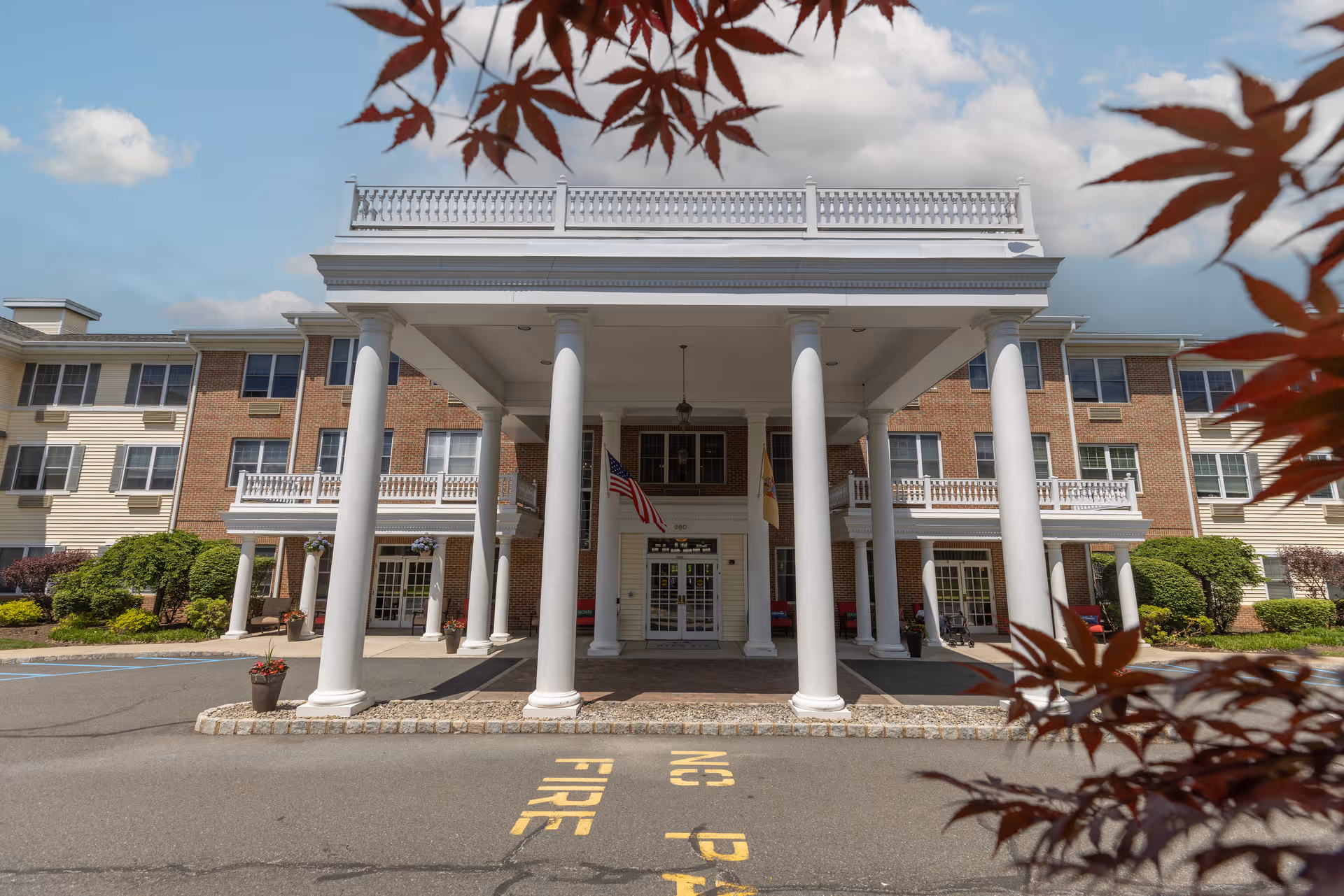 Mira Vie at Green Knoll exterior entrance with large white columns and portico