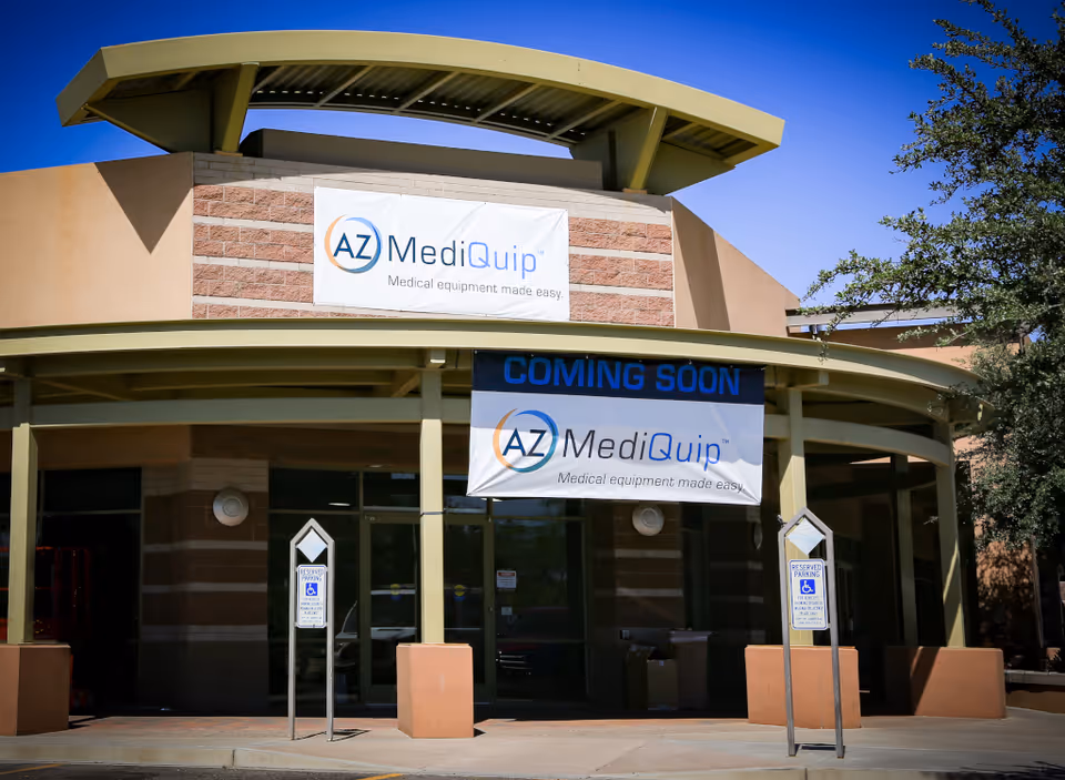 AZ MediQuip Goodyear storefront with Coming Soon banners and glass entrance