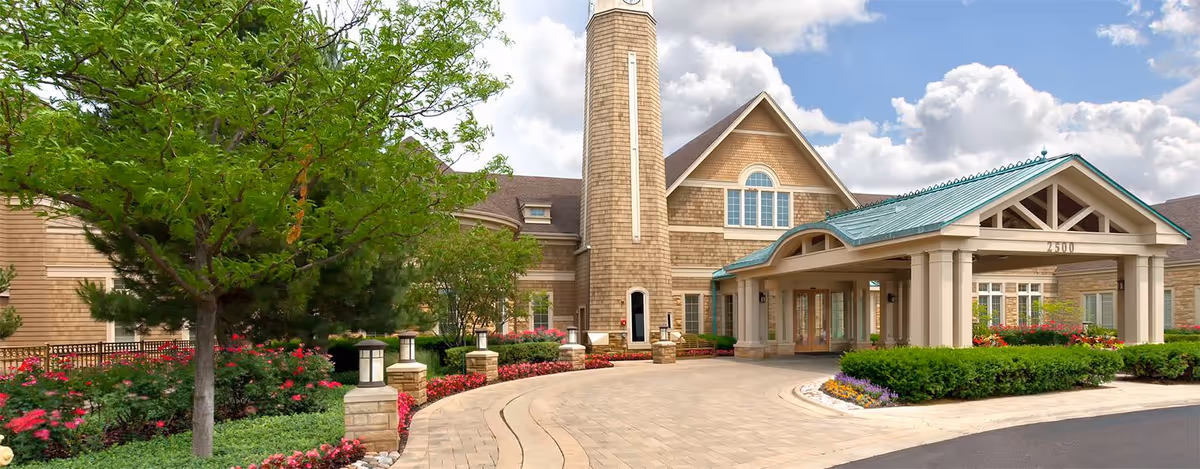 Exterior view of North Shore Compassionate Care facility with welcoming entry and landscaping.