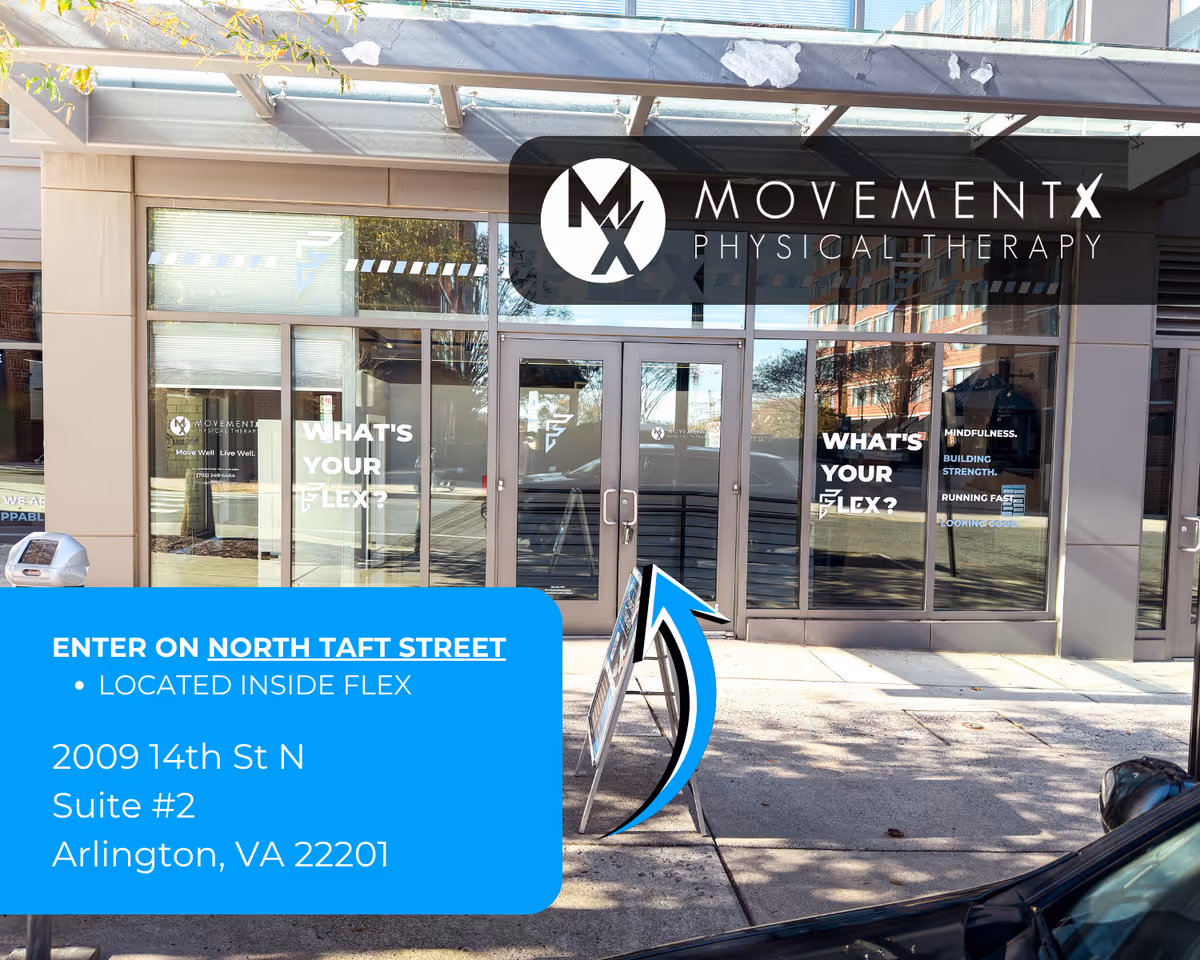 Front entrance to MovementX Physical Therapy with glass doors and a blue promotional sign