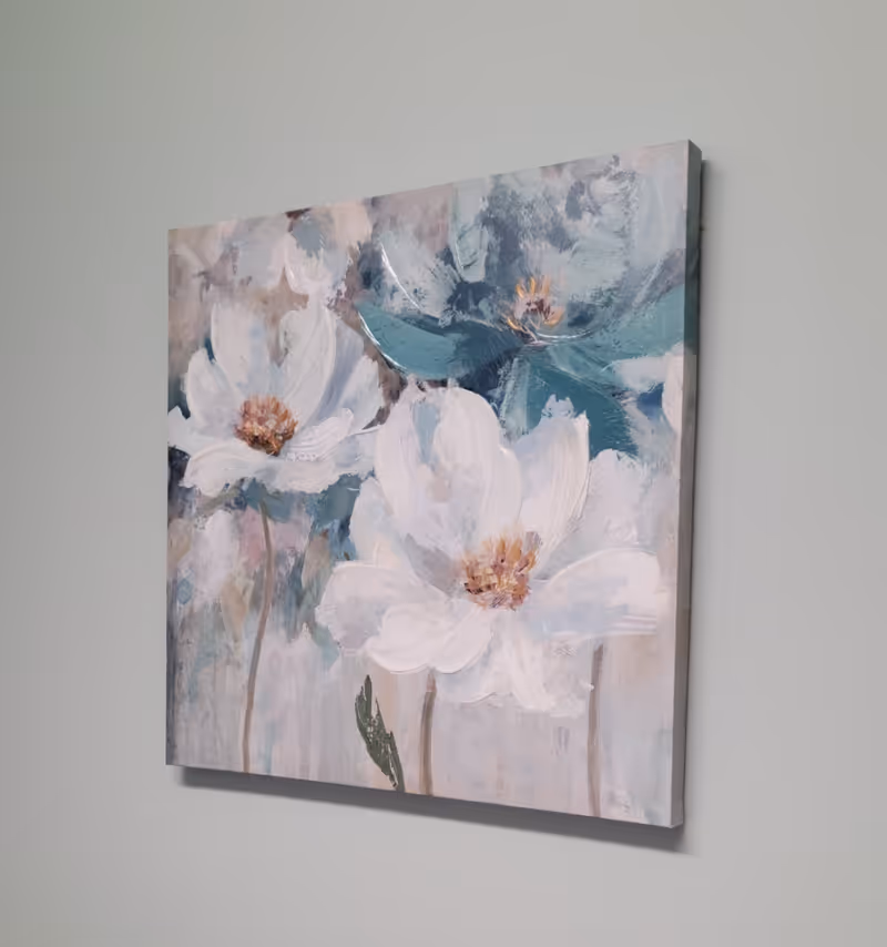 A wall features a large floral painting in soft pastel tones.