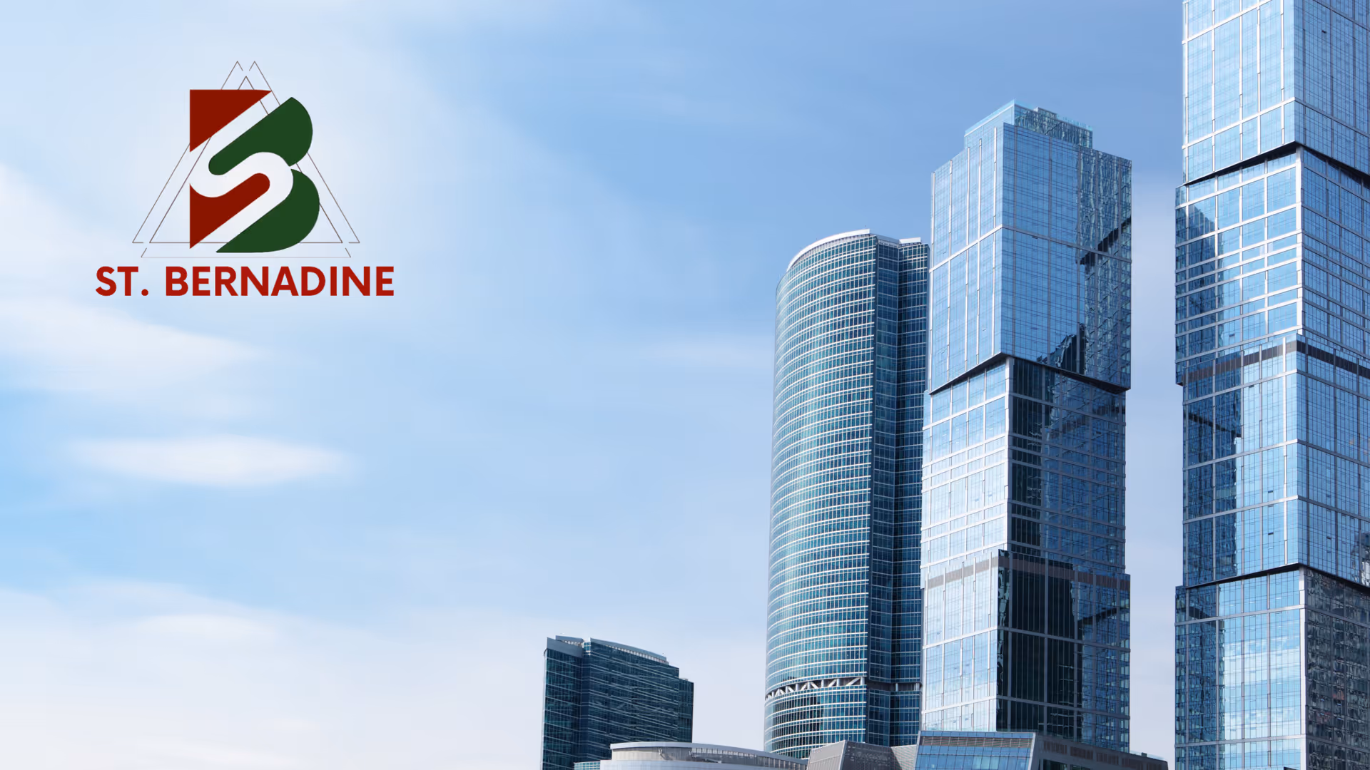 Exterior view of tall glass skyscrapers with a St. Bernadine logo in the upper left.
